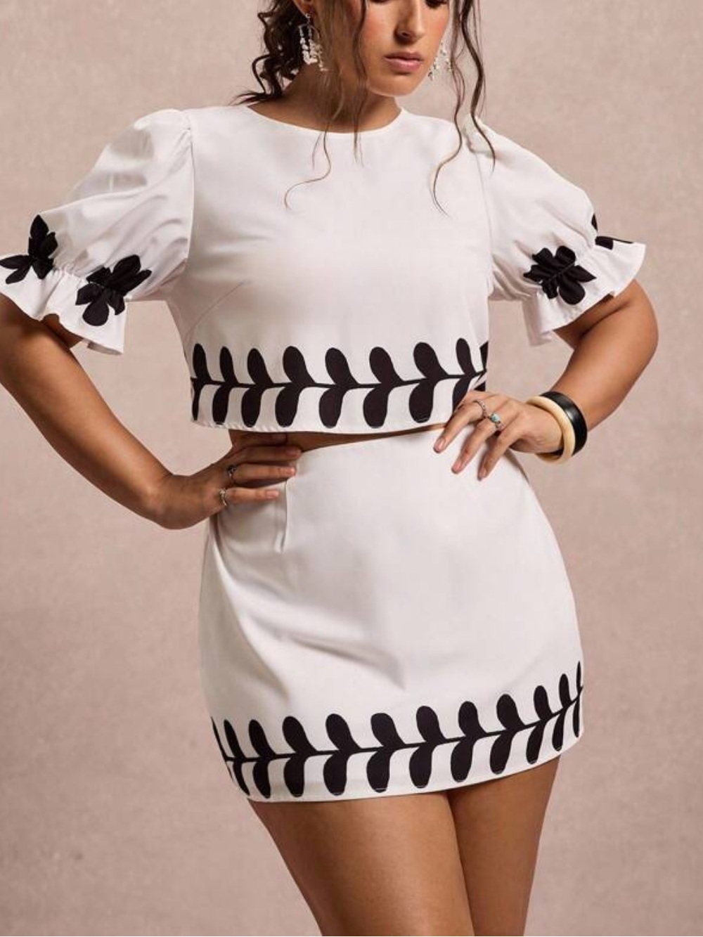 White Mini Skirt & Top with Black Leaf Trim